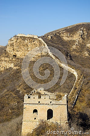 Great Chinese wall ruined in brown autumn Stock Photo