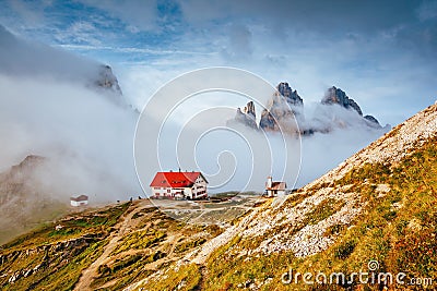 Great foggy view of the National park Tre Cime di Lavaredo. Location Dolomiti alps, Italy Stock Photo