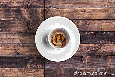 Great italian espresso coffee in a white cup with et @ email symbol shape, technology concept Stock Photo