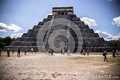 Great Maya symbol of the pyramid of Kukulkan in Chichen Itza being visited by tourists Editorial Stock Photo