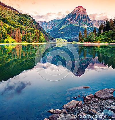 Great morning view of the Obersee lake. Colorful summer sinrise in the Swiss Alps, Nafels village location, Switzerland, Europe. Stock Photo