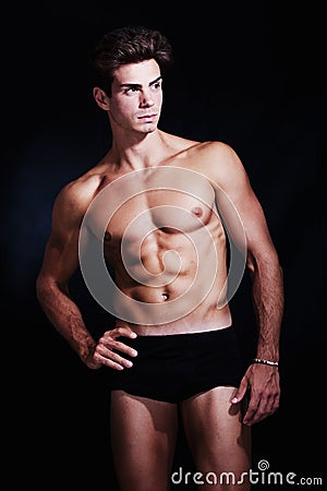 Great, muscular young man model in underwear Stock Photo