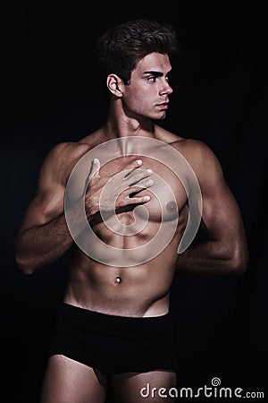 Great, muscular young man model in underwear Stock Photo