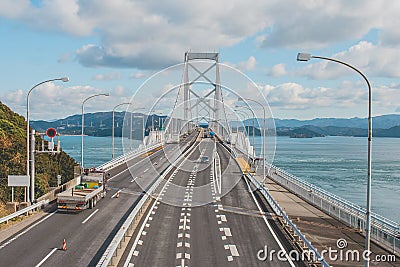 Great Naruto bride cross over ocean and Naruto strait that is beautiful architecture and landmark of Tokushima. Stock Photo