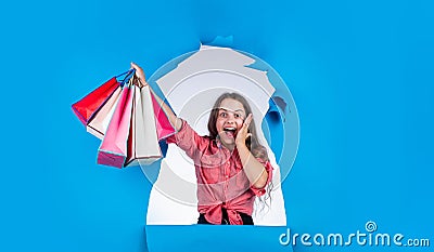 Great news. teen girl carry heavy shopping bags. presents in packages. big sale offer. school market sale began. real Stock Photo