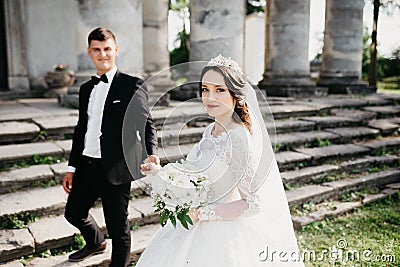 Great portrait of a wedding couple near the old castle Stock Photo