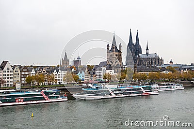 Great St. Martin Cathedral in Cologne with part of the old town buildings Editorial Stock Photo