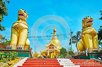 The gilt lions of Mahavijaya Pagoda, Yangon, Myanmar Stock Photo