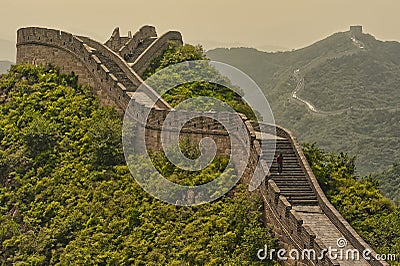The Great Wall of China receding into a fog. Editorial Stock Photo