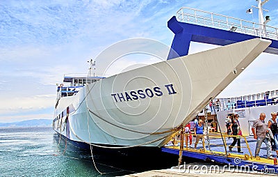 Greece in April, the island of Thassos, a large ferry, transports people and cars that sail from the city of Keramoti to the Editorial Stock Photo