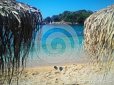Greece syvota beach sunbed sand sea blue holiday travel Editorial Stock Photo