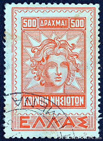 GREECE - CIRCA 1947: A stamp printed in Greece shows Apollo Helios god portrait from an older Rhodian stamp , circa 1947. Editorial Stock Photo