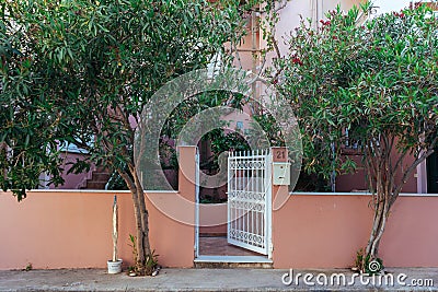 Greece, Crete 2019. open fence gate Editorial Stock Photo