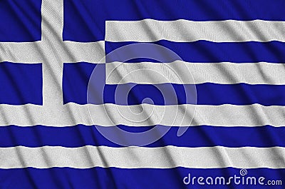 Greece flag is depicted on a sports cloth fabric with many folds. Sport team banner Stock Photo