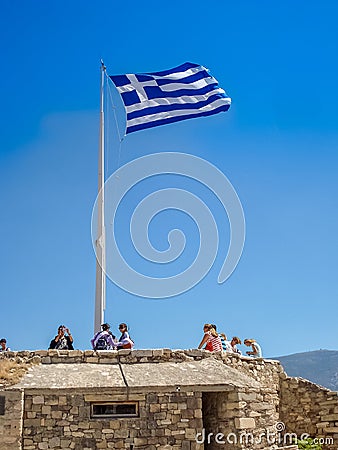 Greece flag at the Parthenon temple at the Acropoli Editorial Stock Photo