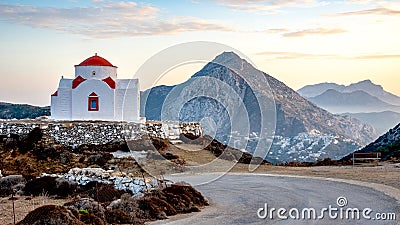GREECE, KARPATHOS - OCTOBER 17, 2019 - Church of St George, in the background the village of Olympos Stock Photo