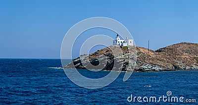 Greece, Kea Tzia island. Seascape with lighthouse, clear blue sky Stock Photo