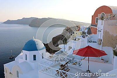 Greece Santorini island in Cyclades. Panoramic view of Caldera sea with ship in background Stock Photo