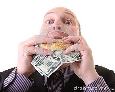 Greed avarice consuming dollars Stock Photo