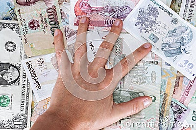 Greedy hand man presses the money Stock Photo