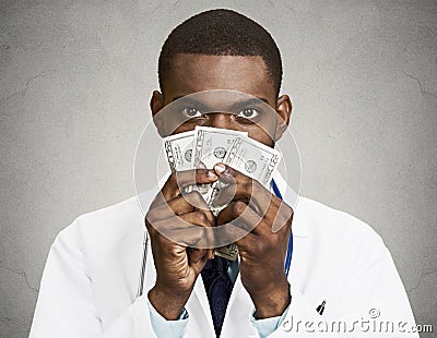 Greedy health care professional, doctor holding cash, money Stock Photo
