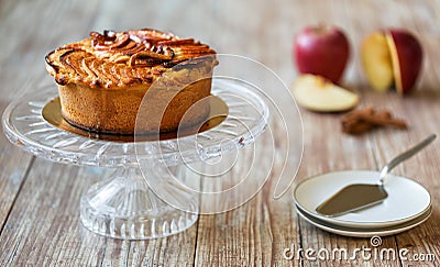 Greek apple pie on crystal cake plate Stock Photo