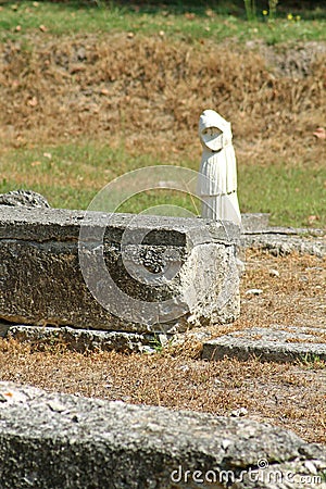 Greek archaic statue torso in Dion, Greece Stock Photo