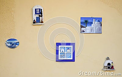 Greek blue tiles on beige wall Stock Photo