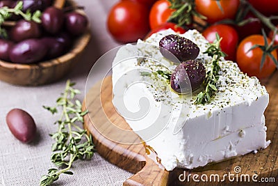 Greek cheese feta with thyme and olives Stock Photo