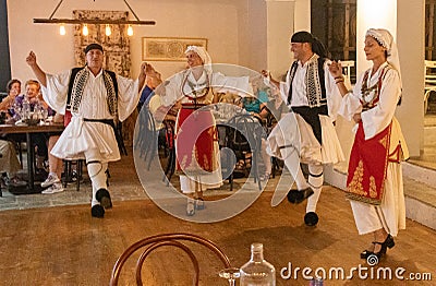 Greek Dancers Performing For Tourists Editorial Stock Photo