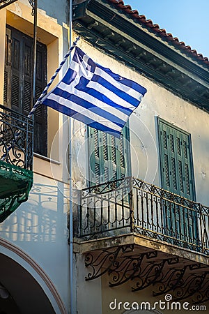 Greek flag on the balcony Stock Photo