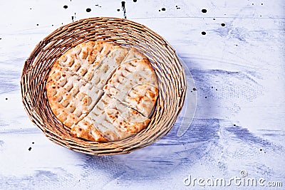 Greek flatbread in basket Stock Photo