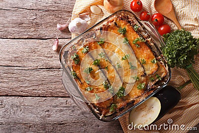 Greek moussaka in baking dish with the ingredients. horizontal t Stock Photo