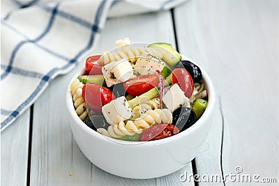 Greek salad with pasta Stock Photo