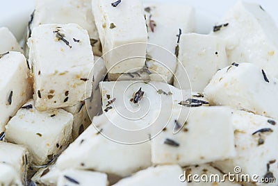 Greek white cheese feta with herbs closup Stock Photo