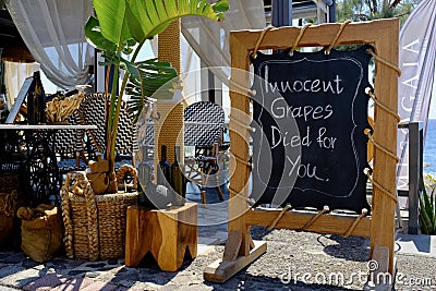 Greek Wine Bar With Funny Sign Stock Photo