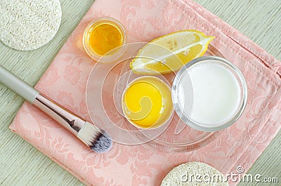 Greek yogurt sour cream or kefir, raw egg, lemon and olive oil. Homemade beauty treatments recipe. Stock Photo