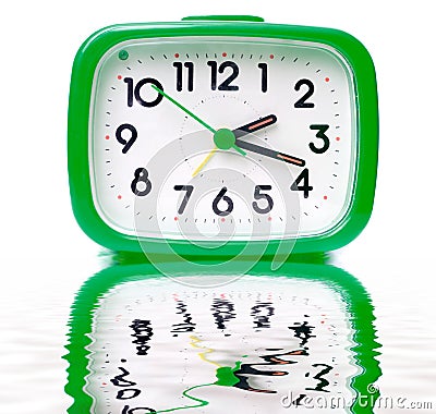 Green alarm clock Stock Photo