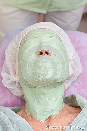 Green alginate face mask. Stock Photo