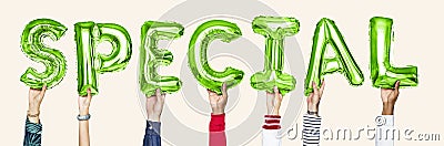 Green alphabet balloons forming the word special Stock Photo