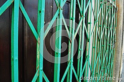 Green anti theft brackets over door Stock Photo