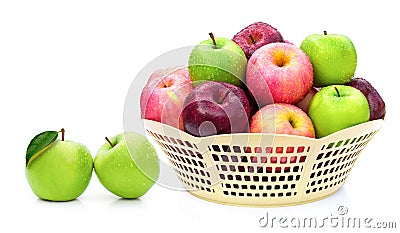 apple fruits with water drops in basket isolated on white . Stock Photo