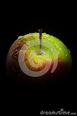Green apple in black isolation Stock Photo