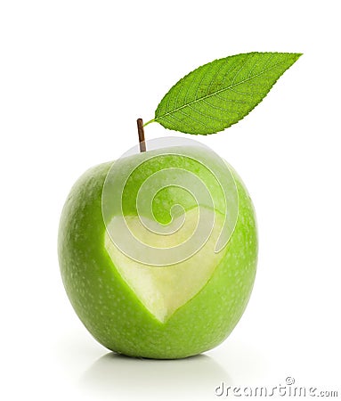 Green apple with cut heart Stock Photo