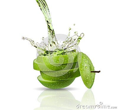 Green apple juice splashing with its fruits Stock Photo