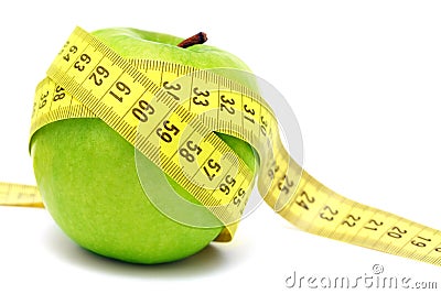 Green apple and measuring tape Stock Photo