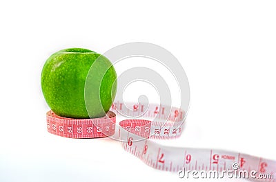 Fresh green apple and measuring tape isolated on white background Stock Photo