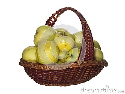 Green apples in a decorative fruit basket isolated on white back Stock Photo