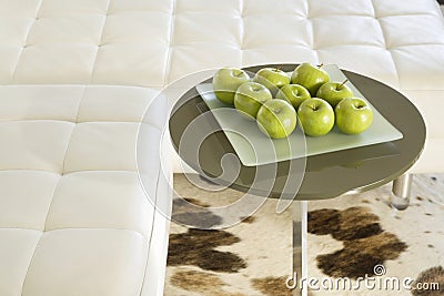 Green Apples on Living Room Table Stock Photo