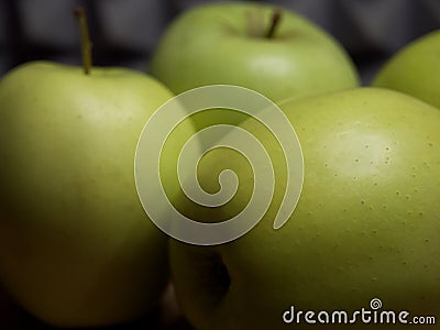 Green apples of the Reinette Simirenko variety, close-up Stock Photo